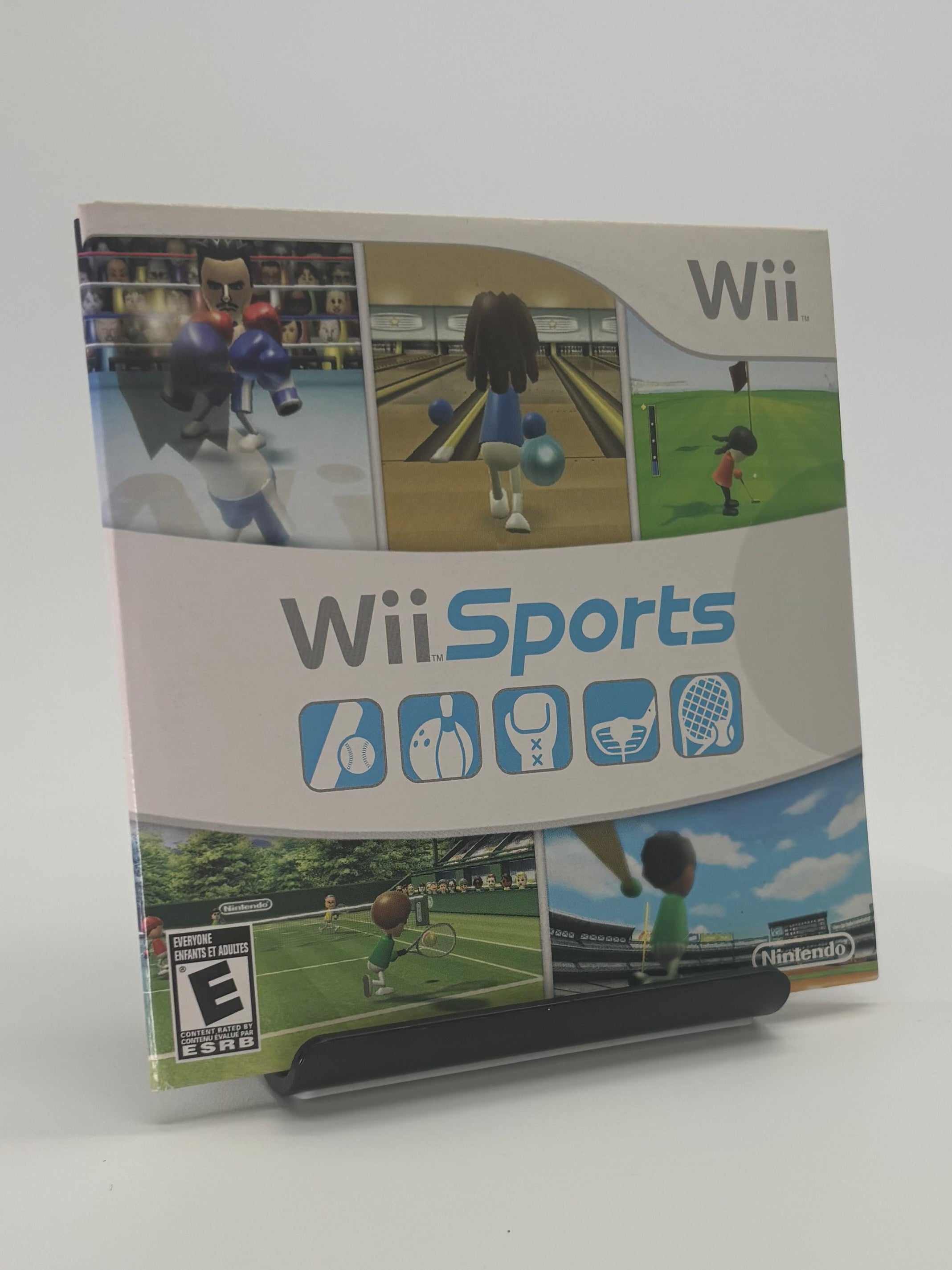 Wii Sports game box on a white surface